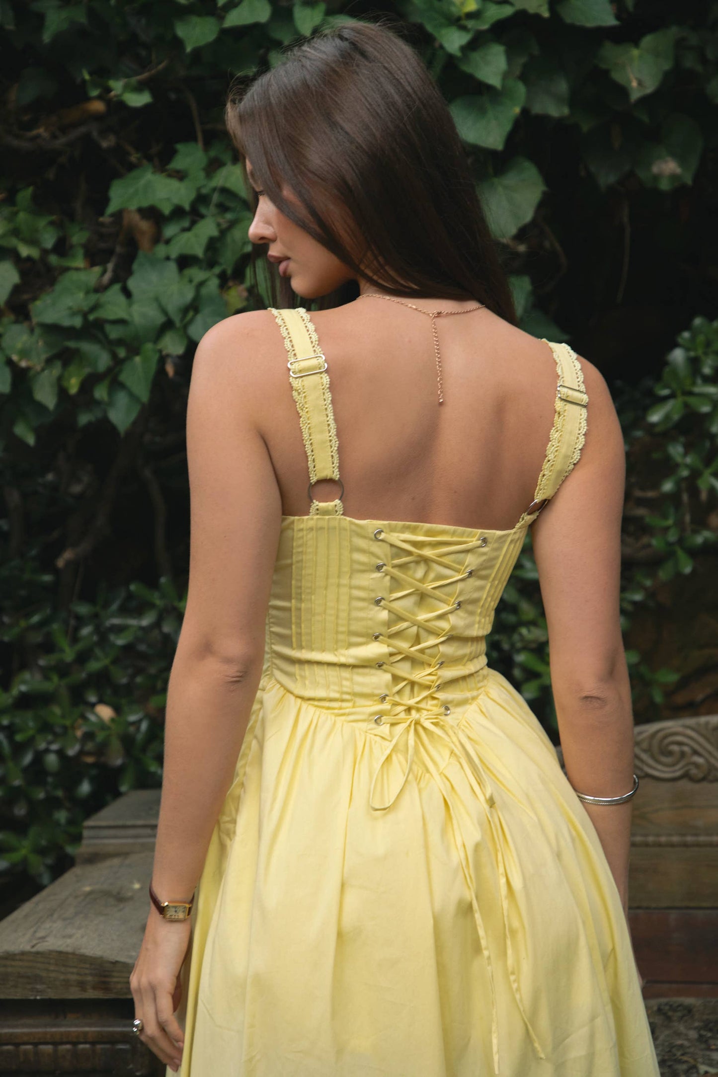Back view honey lace corset maxi dress with lace-up corset detail from She Rare Boutique
