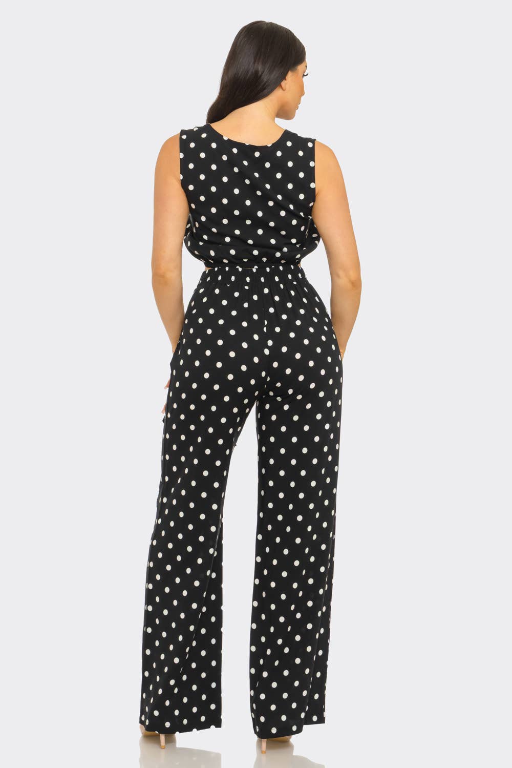 Back view black polka dot two piece pant set from She Rare Boutique