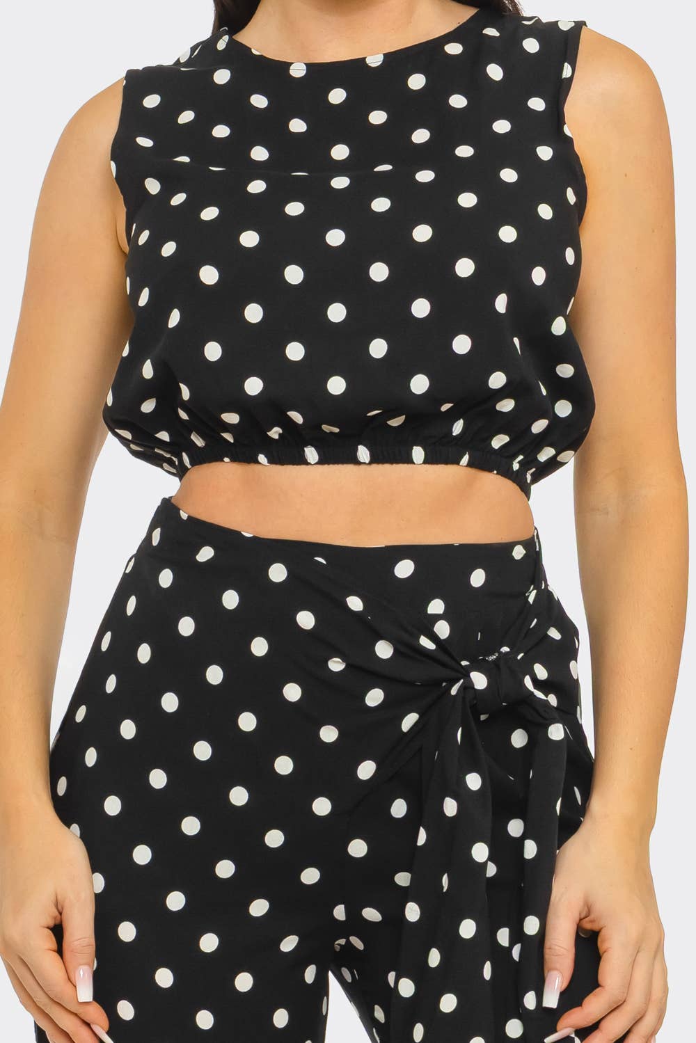 Polka dot print detail on black pant set from She Rare Boutique