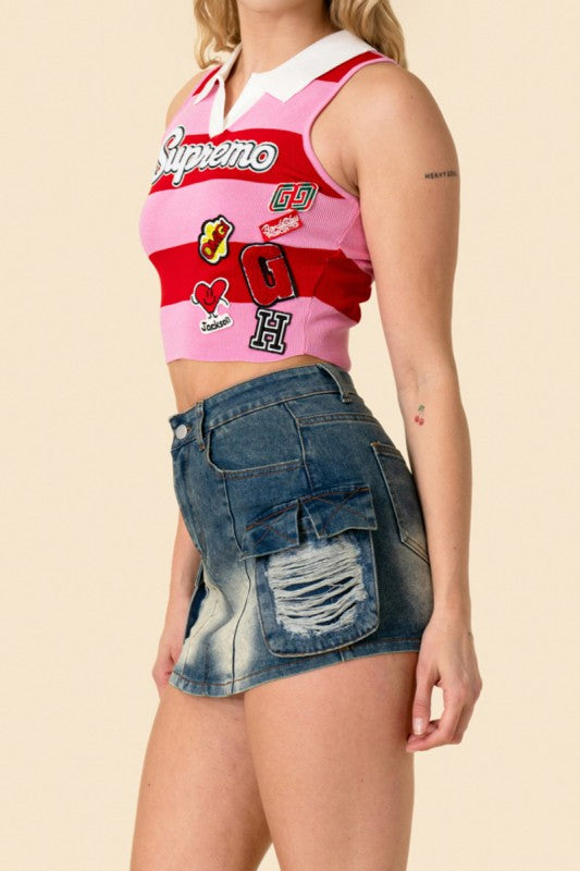 Graphic patch detail on Cherry Pop stripe crop tank from She Rare Boutique