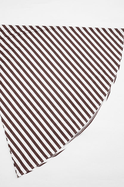 Grand Entrance Top in brown close-up of the diagonal stripes on the cape sleeve