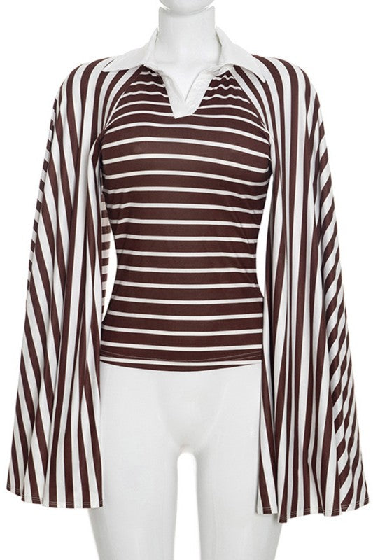 Grand Entrance Top in brown with sleeves spread open to show the dramatic cape sleeve shape